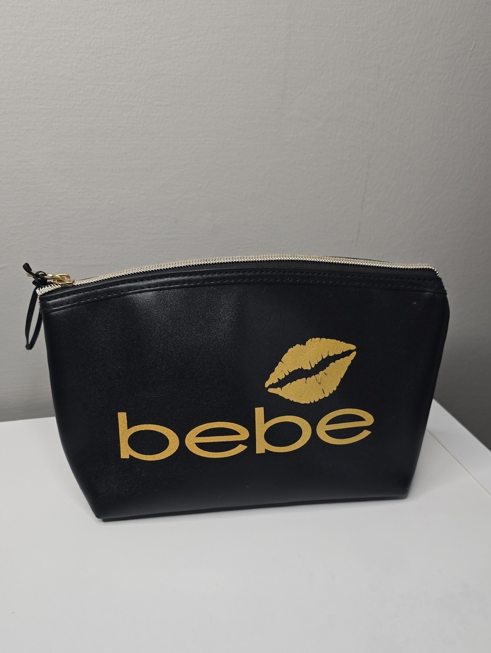 bebe Black Cosmetic Case with Gold Lip Logo